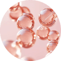 Cluster of transparent bubbles on a pink background.