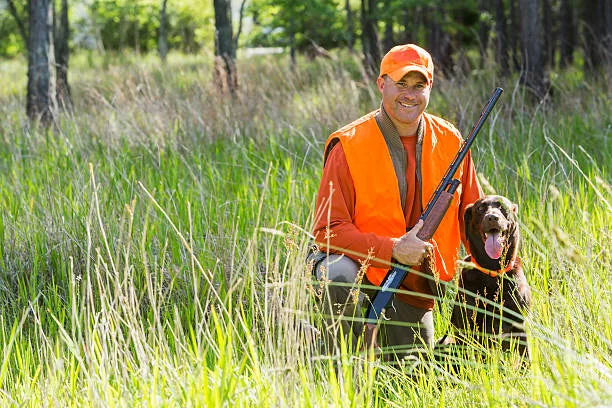 Chasseur avec son retriever
